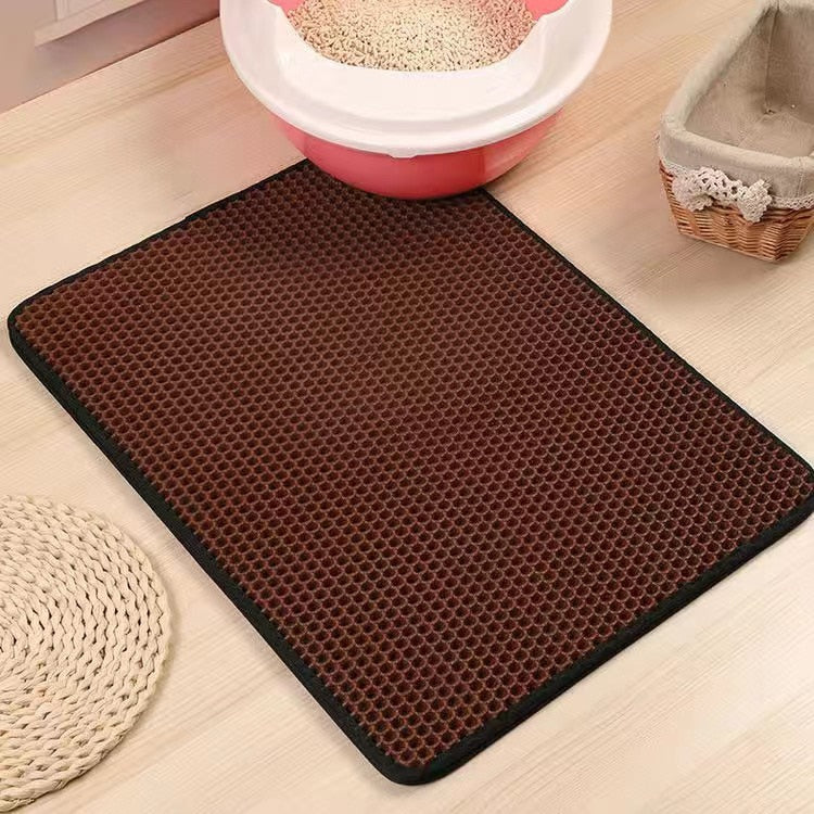 Atrapador de arena sanitaria de gatos Catchs™